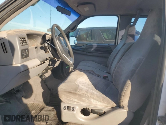 1999 Ford F-250 XL with VIN 1FTNX21L5XEE86694, listed as a Copart auction lot 41697885 with 153,948 mi miles and Salvage title. Bid and sale history available at DreamBid. Image 7.