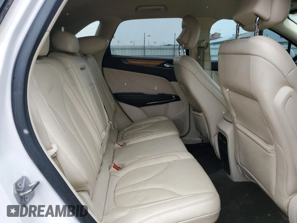 2015 Lincoln MKC z VIN 5LMTJ2AH6FUJ37822, wystawiony jako Copart lot #51931505 z przebiegiem 138 188 mil mil oraz Szkoda całkowita • Salvage title. Historia ofert i sprzedaży dostępna na DreamBid. Obrazek 11.
