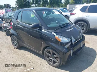 2012 Smart fortwo Pure z VIN WMEEJ3BAXCK526477, wystawiony jako IAAI lot #42392611 z przebiegiem 143 378 mil mil oraz . Historia ofert i sprzedaży dostępna na DreamBid. Obrazek 1.