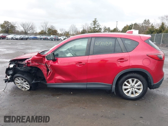 2014 Mazda CX-5 Touring with VIN JM3KE2CY2E0322211, listed as a IAAI auction lot 41721219 with 127,312 mi miles. Bid and sale history available at carsss.com. Image 14.