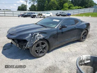 2019 Chevrolet Camaro 1LT z VIN 1G1FB1RXXK0138117, wystawiony jako Copart lot #60755675 z przebiegiem 89 872 mil mil oraz Czysty tytuł • Clean title. Historia ofert i sprzedaży dostępna na DreamBid. Obrazek 1.