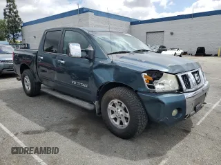 2006 Nissan Titan SE with VIN 1N6AA07B76N502666, listed as a Copart auction lot 56917515 with 118,877 mi miles and Salvage title. Bid and sale history available at DreamBid. Image 4.