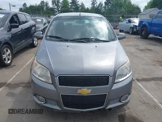 2011 Chevrolet Aveo 2LT z VIN KL1TG6DE7BB172574, wystawiony jako IAAI lot #42136995 z przebiegiem 167 649 mil mil oraz . Historia ofert i sprzedaży dostępna na DreamBid. Obrazek 6.