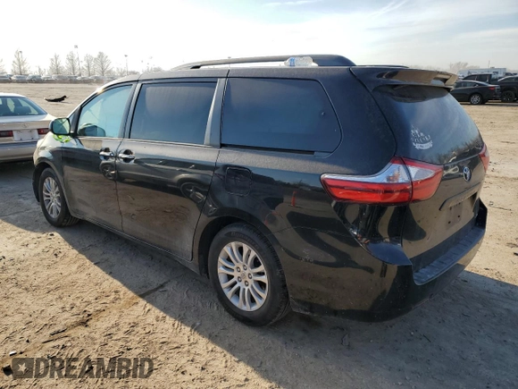 2015 Toyota Sienna XLE с VIN 5TDYK3DC2FS573488, выставлен на аукционе Copart как лот 44770774 с пробегом 158 502 миль миль и Списание • Salvage title. История ставок и продаж доступна на DreamBid. Изображение 2.