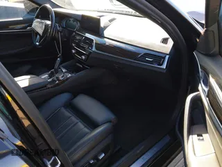 2019 BMW 5 Series 530e with VIN WBAJA9C57KB399541, listed as a IAAI auction lot 41656775 with 96,523 mi miles and . Bid and sale history available at DreamBid. Image 5.