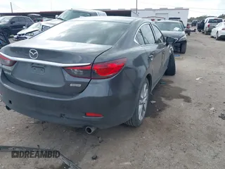2017 Mazda 6 Touring with VIN JM1GL1V57H1127804, listed as a IAAI auction lot 41515342 with 107,336 mi miles and . Bid and sale history available at carsss.com. Image 4.