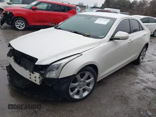 2013 Cadillac ATS Performance z VIN 1G6AJ5S38D0145690, wystawiony jako IAAI lot #41517865 z przebiegiem 136 606 mil mil oraz . Historia ofert i sprzedaży dostępna na DreamBid. Obrazek 2.