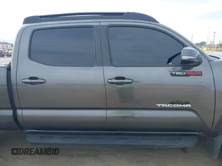 2021 Toyota Tacoma 4WD SR5 with VIN 3TMDZ5BN5MM110218, listed as a IAAI auction lot 41430303 with 47,781 mi miles. Bid and sale history available at carsss.com. Image 13.