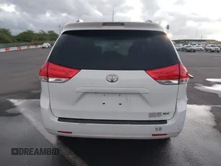 2014 Toyota Sienna XLE with VIN 5TDYK3DC1ES429932, listed as a IAAI auction lot 41692134 with 93,625 mi miles. Bid and sale history available at carsss.com. Image 17.