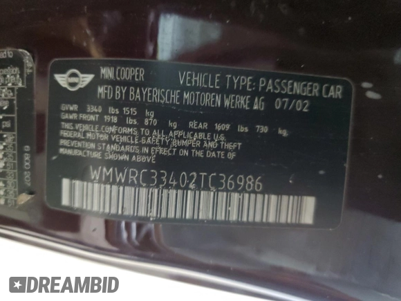 2002 MINI Hardtop with VIN WMWRC33402TC36986, listed as a Copart auction lot 50131045 with 194,224 mi miles and Salvage Title. Bid and sale history available at DreamBid. Image 12.