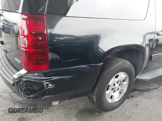2011 Chevrolet Suburban LT with VIN 1GNSCJE01BR327933, listed as a IAAI auction lot 41813011 with 279,627 mi miles. Bid and sale history available at carsss.com. Image 20.