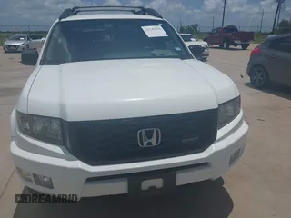 2014 Honda Ridgeline Sport with VIN 5FPYK1F71EB011340, listed as a IAAI auction lot 42741956 with 156,149 mi miles and . Bid and sale history available at DreamBid. Image 6.