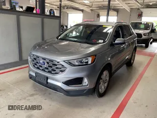 2020 Ford Edge Titanium z VIN 2FMPK3K92LBA30525, wystawiony jako IAAI lot #42284108 z przebiegiem 101 779 mil mil oraz . Historia ofert i sprzedaży dostępna na DreamBid. Obrazek 1.