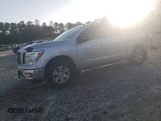 2019 Nissan Titan S with VIN 1N6AA1EK0KN512684, listed as a Copart auction lot 84549494 with 75,201 mi miles and Salvage title. Bid and sale history available at DreamBid. Image 1.