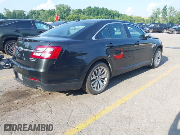 2014 Ford Taurus Limited with VIN 1FAHP2F86EG163392, listed as a IAAI auction lot 42538336 with 131,910 mi miles and . Bid and sale history available at DreamBid. Image 4.