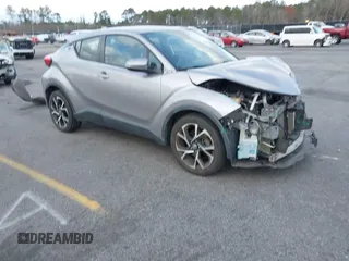 2019 Toyota C-HR XLE with VIN NMTKHMBX7KR078292, listed as a IAAI auction lot 41705966 with 104,352 mi miles. Bid and sale history available at carsss.com. Image 1.
