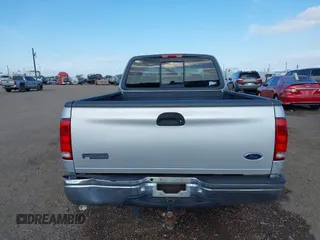 1999 Ford F-250 z VIN 2FTRX27L3XCA14587, wystawiony jako IAAI lot #42022998 z przebiegiem Nie podano mil oraz . Historia ofert i sprzedaży dostępna na DreamBid. Obrazek 16.
