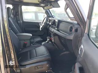 2025 Jeep Wrangler Rubicon with VIN 1C4PJXFNXSW532895, listed as a IAAI auction lot 42694548 with 1,886 mi miles and . Bid and sale history available at DreamBid. Image 5.