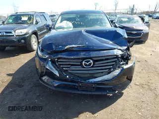 2017 Mazda CX-9 Touring with VIN JM3TCBCY3H0139866, listed as a IAAI auction lot 41849281 with 135,259 mi miles and . Bid and sale history available at DreamBid. Image 13.