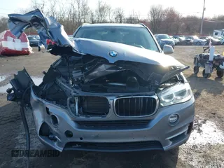 2014 BMW X5 xDrive35i z VIN 5UXKR0C52E0H19670, wystawiony jako IAAI lot #41909590 z przebiegiem 137 758 mil mil oraz . Historia ofert i sprzedaży dostępna na DreamBid. Obrazek 12.