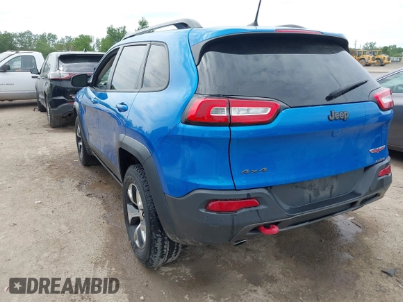 2017 Jeep Cherokee Trailhawk with VIN 1C4PJMBS2HW612792, listed as a IAAI auction lot 42373828 with 74,106 mi miles and . Bid and sale history available at DreamBid. Image 3.
