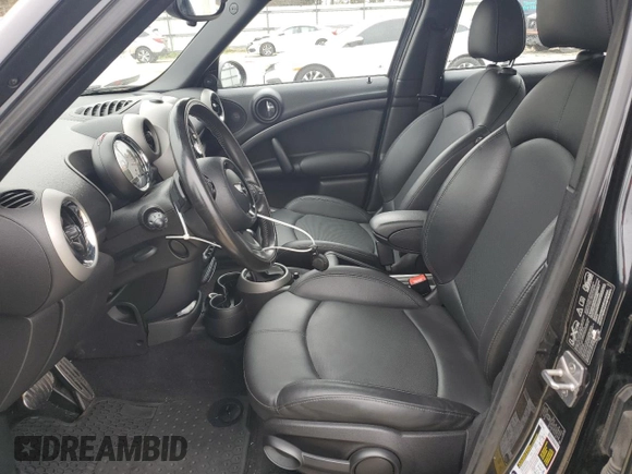 2011 MINI Countryman S with VIN WMWZC5C57BWL53271, listed as a Copart auction lot 48595315 with 107,716 mi miles and Clean Title. Bid and sale history available at DreamBid. Image 7.