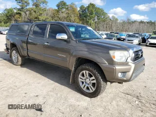 2013 Toyota Tacoma PreRunner with VIN 3TMKU4HNXDM035233, listed as a Copart auction lot 86717434 with 137,005 mi miles and Salvage title. Bid and sale history available at DreamBid. Image 4.