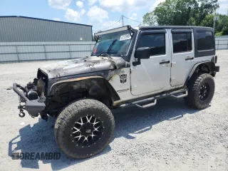 2007 Jeep Wrangler Unlimited Sahara with VIN 1J4GA59167L183198, listed as a Copart auction lot 62135995 with Not provided miles and Salvage title. Bid and sale history available at DreamBid. Image 1.