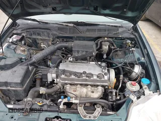 2000 Honda Civic LX with VIN 1HGEJ6673YL069805, listed as a IAAI auction lot 41511192 with 80,097 mi miles. Bid and sale history available at carsss.com. Image 10.