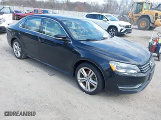 2014 Volkswagen Passat SE w/Sunroof with VIN 1VWBT7A36EC094597, listed as a IAAI auction lot 41933027 with 1 mi miles. Bid and sale history available at carsss.com. Image 1.