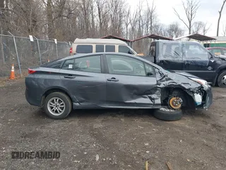 2018 Toyota Prius Two z VIN JTDKBRFU7J3065008, wystawiony jako IAAI lot #41744883 z przebiegiem 94 031 mil mil oraz . Historia ofert i sprzedaży dostępna na DreamBid. Obrazek 13.