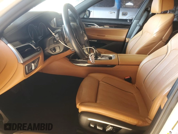 2016 BMW 7 Series 750i с VIN WBA7F0C56GGM20803, выставлен на аукционе Copart как лот 51183415 с пробегом 70 728 миль миль и Чистый • Clean title. История ставок и продаж доступна на DreamBid. Изображение 7.