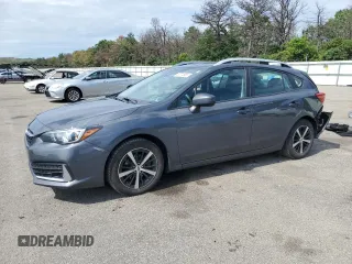 2021 Subaru Impreza Premium with VIN 4S3GTAD63M3712159, listed as a Copart auction lot 62774905 with 62,766 mi miles and Salvage title. Bid and sale history available at DreamBid. Image 1.