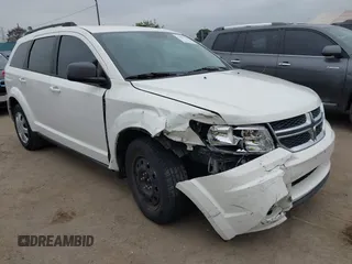 2014 Dodge Journey American Value with VIN 3C4PDCAB8ET141803, listed as a IAAI auction lot 42097292 with 76,339 mi miles and . Bid and sale history available at DreamBid. Image 1.