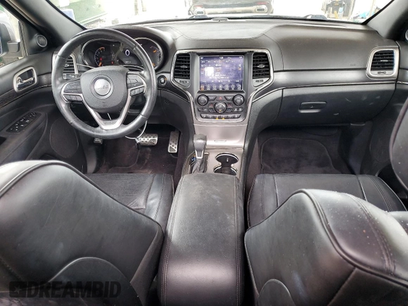 2018 Jeep Grand Cherokee High Altitude with VIN 1C4RJFCT8JC344110, listed as a Copart auction lot 60257065 with 94,917 mi miles and Salvage title. Bid and sale history available at DreamBid. Image 8.