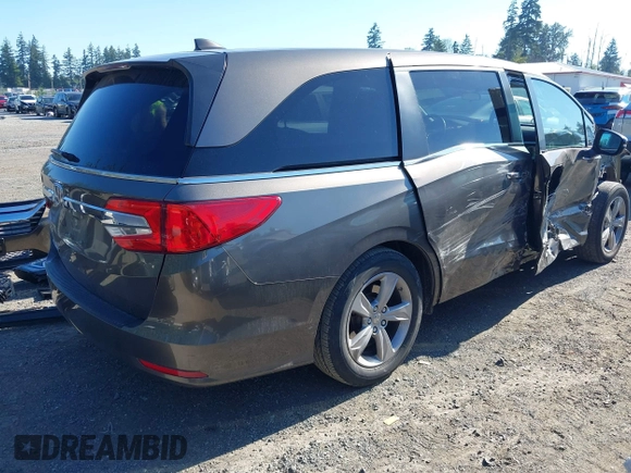2018 Honda Odyssey EX with VIN 5FNRL6H5XJB100482, listed as a IAAI auction lot 42616266 with 82,953 mi miles and . Bid and sale history available at DreamBid. Image 4.