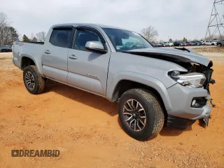 2020 Toyota Tacoma SR5 z VIN 5TFCZ5AN4LX225401, wystawiony jako Copart lot #53544005 z przebiegiem 110 946 mil mil oraz Szkoda całkowita • Salvage title. Historia ofert i sprzedaży dostępna na DreamBid. Obrazek 4.