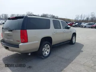 2014 GMC Yukon XL SLT with VIN 1GKS2KE71ER110308, listed as a IAAI auction lot 41940610 with 202,071 mi miles. Bid and sale history available at carsss.com. Image 4.