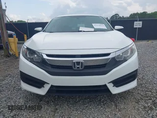 2017 Honda Civic LX with VIN 19XFC2F58HE010262, listed as a IAAI auction lot 42118124 with 125,535 mi miles and . Bid and sale history available at DreamBid. Image 12.