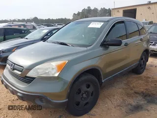 2007 Honda CR-V LX with VIN JHLRE38307C017076, listed as a IAAI auction lot 41767875 with 221,195 mi miles. Bid and sale history available at carsss.com. Image 2.