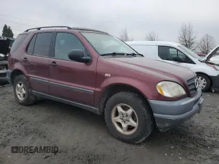 1998 Mercedes-Benz M-Class with VIN 4JGAB54E4WA028593, listed as a Copart auction lot 88130125 with 200,823 mi miles and Clean Title. Bid and sale history available at carsss.com. Image 4.