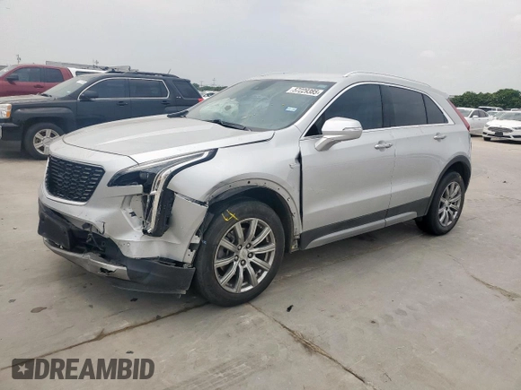 2021 Cadillac XT4 FWD Premium Luxury z VIN 1GYFZCR42MF004233, wystawiony jako Copart lot #57229385 z przebiegiem 98 387 mil mil oraz Szkody całkowita. Historia ofert i sprzedaży dostępna na DreamBid. Obrazek 1.