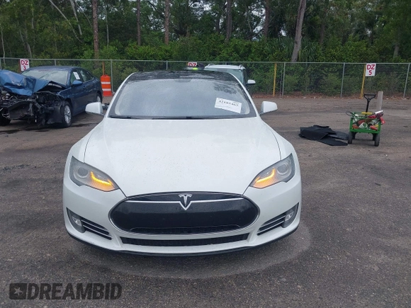 2013 Tesla Model S Performance with VIN 5YJSA1DP9DFP04076, listed as a IAAI auction lot 42185465 with 179,640 mi miles and . Bid and sale history available at DreamBid. Image 12.
