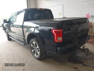 2015 Ford F-150 XLT with VIN 1FTEW1EPXFKE99354, listed as a IAAI auction lot 42245005 with 160,164 mi miles and . Bid and sale history available at DreamBid. Image 3.