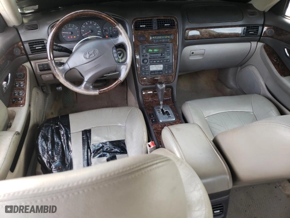 2003 Hyundai XG350 with VIN KMHFU45EX3A256912, listed as a Copart auction lot 80879044 with 152,669 mi miles and Salvage Title. Bid and sale history available at carsss.com. Image 8.