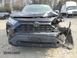 2020 Toyota RAV4 XLE with VIN 2T3P1RFV6LC101399, listed as a Copart auction lot 48256825 with 58,966 mi miles and Salvage Title. Bid and sale history available at DreamBid. Image 5.