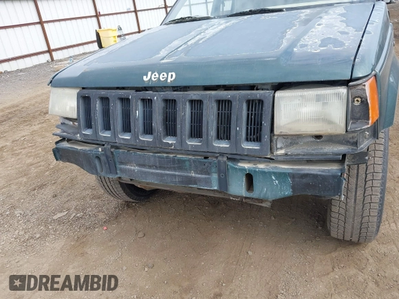 1994 Jeep Grand Cherokee Laredo with VIN 1J4GZ58S9RC215874, listed as a IAAI auction lot 42577378 with 230,824 mi miles and . Bid and sale history available at DreamBid. Image 6.