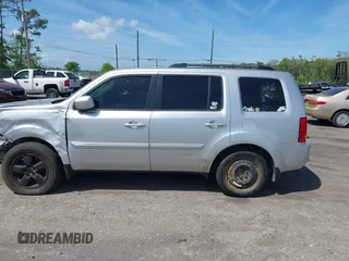 2011 Honda Pilot EX-L with VIN 5FNYF4H60BB096041, listed as a IAAI auction lot 41971952 with 165,868 mi miles and . Bid and sale history available at carsss.com. Image 14.
