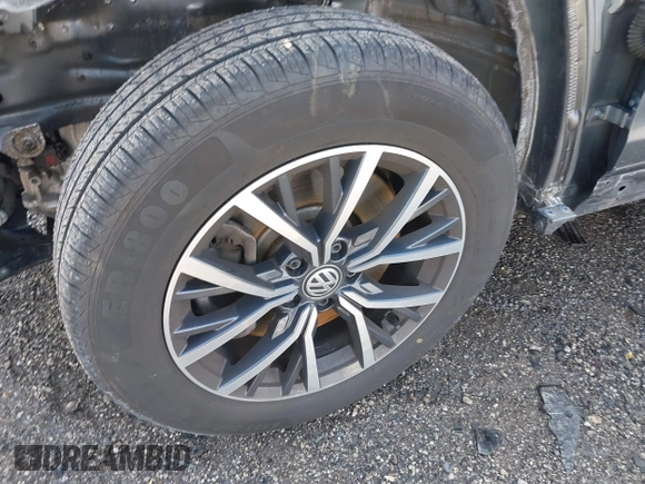 2019 Volkswagen Tiguan SE with VIN 3VV2B7AX5KM198454, listed as a IAAI auction lot 42033410 with 64,381 mi miles and . Bid and sale history available at DreamBid. Image 12.