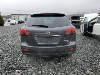 2013 Mazda CX-9 Grand Touring with VIN JM3TB3DV0D0401639, listed as a Copart auction lot 52300985 with 131,857 mi miles and Clean title. Bid and sale history available at DreamBid. Image 6.